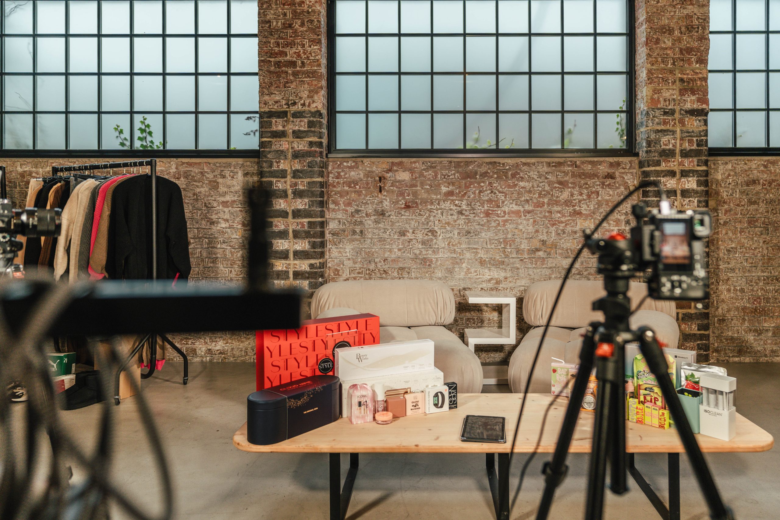 Interlude Studio shooting space with warehouse windows and brick